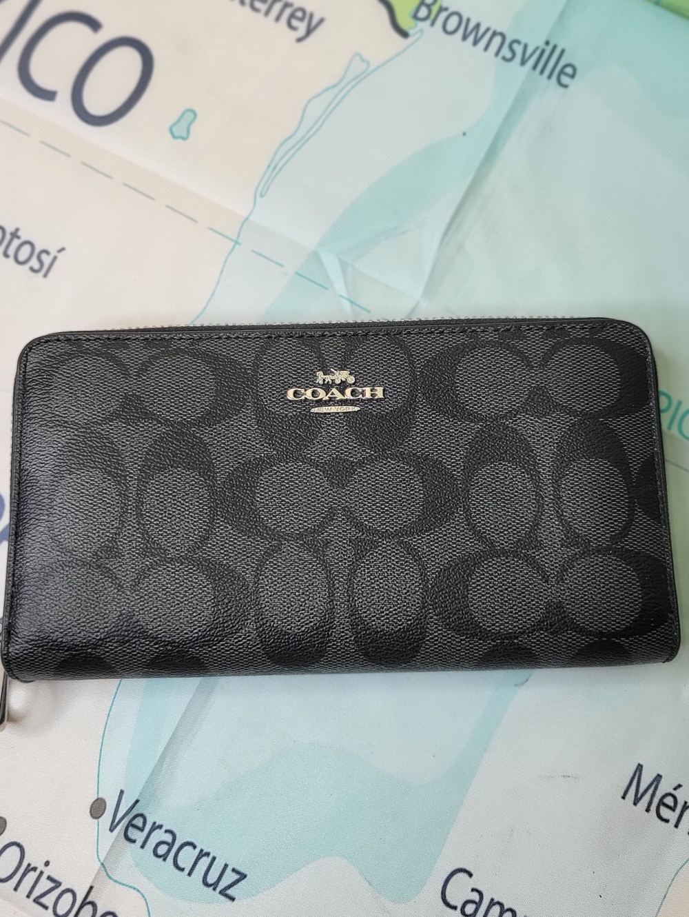 Coach Black Signature Zip-Around Wallet with Gold Logo